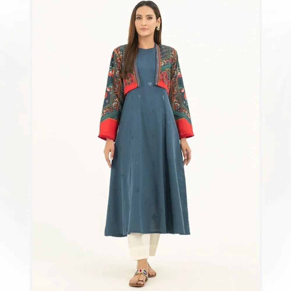 2 piece dress With a mixture of red, teal and green colors Size Medium